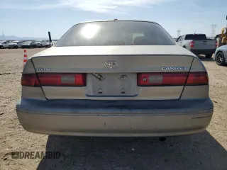 1999 Toyota Camry LE с VIN JT2BG22KXX0284593, выставлен на аукционе Copart как лот 54061685 с пробегом 229 047 миль миль и Списание • Salvage title. История ставок и продаж доступна на DreamBid. Изображение 6.