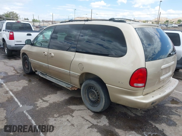 1999 Chrysler Town & Country LXi with VIN 1C4GP54L0XB512495, listed as a IAAI auction lot 39677461 with 284,495 mi miles. Bid and sale history available at carsss.com. Image 3.