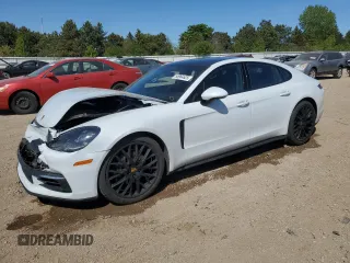 2018 Porsche Panamera z VIN WP0AA2A73JL105480, wystawiony jako Copart lot #55964625 z przebiegiem 28 269 mil mil oraz Szkoda całkowita • Salvage title. Historia ofert i sprzedaży dostępna na DreamBid. Obrazek 1.