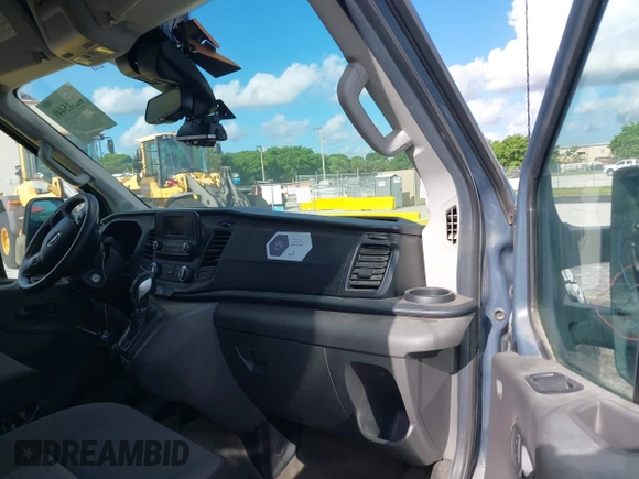 2021 Ford Transit Cargo with VIN 1FTBR3X89MKA54791, listed as a IAAI auction lot 42515449 with 57,847 mi miles and . Bid and sale history available at DreamBid. Image 5.