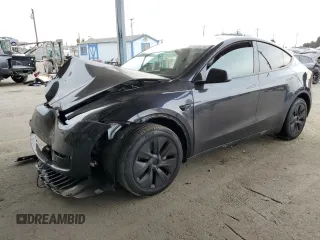 2025 Tesla Model Y Long Range with VIN 7SAYGDED8SF218700, listed as a Copart auction lot 84720474 with 1,832 mi miles and Salvage Title. Bid and sale history available at DreamBid. Image 1.