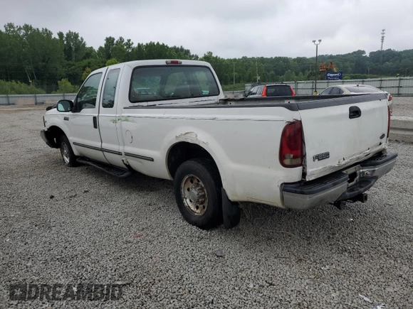 1999 Ford F-250 XL with VIN 1FTNX20S1XEB68189, listed as a Copart auction lot 60920605 with 209,822 mi miles and Salvage title. Bid and sale history available at DreamBid. Image 2.
