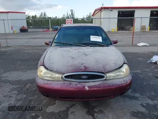 1999 Ford Contour SE z VIN 1FAFP6635XK169090, wystawiony jako IAAI lot #42198696 z przebiegiem 114 933 mil mil oraz . Historia ofert i sprzedaży dostępna na DreamBid. Obrazek 12.