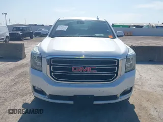 2017 GMC Yukon SLT z VIN 1GKS1BKC2HR378437, wystawiony jako IAAI lot #41923260 z przebiegiem 127 356 mil mil oraz . Historia ofert i sprzedaży dostępna na DreamBid. Obrazek 12.