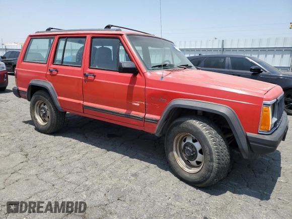 1996 Jeep Cherokee SE with VIN 1J4FT28S3TL213153, listed as a Copart auction lot 57217625 with 331,741 mi miles and Salvage title. Bid and sale history available at DreamBid. Image 4.