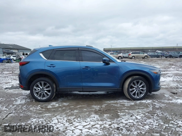 2020 Mazda CX-5 Grand Touring with VIN JM3KFBDM2L0778831, listed as a IAAI auction lot 41739655 with 72,533 mi miles. Bid and sale history available at carsss.com. Image 14.