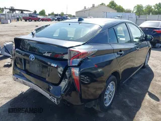 2016 Toyota Prius Two with VIN JTDKBRFU9G3021083, listed as a IAAI auction lot 41986733 with 117,227 mi miles and . Bid and sale history available at DreamBid. Image 4.