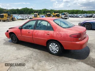 1997 Ford Escort LX with VIN 1FALP13P2VW128399, listed as a Copart auction lot 58775365 with 85,434 mi miles and Salvage title. Bid and sale history available at DreamBid. Image 2.