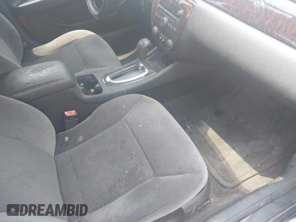 2015 Chevrolet Impala LT with VIN 2G1WB5E33F1127786, listed as a IAAI auction lot 42467374 with 160,964 mi miles and . Bid and sale history available at DreamBid. Image 5.