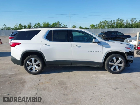 2021 Chevrolet Traverse LT z VIN 1GNERHKWXMJ163645, wystawiony jako IAAI lot #41949887 z przebiegiem 89 448 mil mil oraz . Historia ofert i sprzedaży dostępna na DreamBid. Obrazek 13.