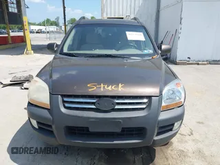 2005 Kia Sportage LX with VIN KNDJE723957075445, listed as a IAAI auction lot 42573760 with 185,000 mi miles and . Bid and sale history available at DreamBid. Image 6.