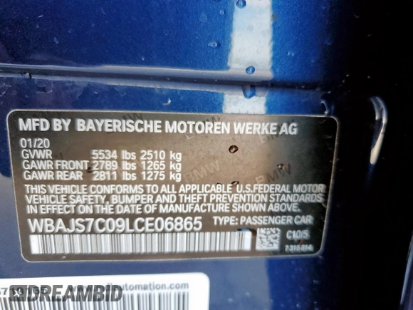 2020 BMW 5 Series M550i xDrive with VIN WBAJS7C09LCE06865, listed as a Copart auction lot 60140955 with Not provided miles and Salvage title. Bid and sale history available at DreamBid. Image 12.