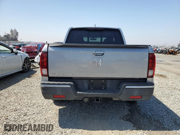 2019 Honda Ridgeline RTL with VIN 5FPYK2F55KB003581, listed as a Copart auction lot 61231815 with 77,166 mi miles and Salvage title. Bid and sale history available at DreamBid. Image 6.