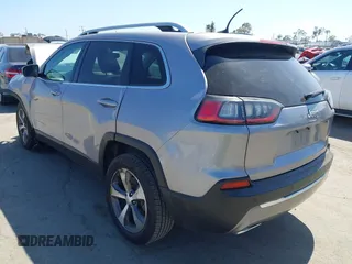 2021 Jeep Cherokee Limited with VIN 1C4PJLDX0MD100067, listed as a IAAI auction lot 42273029 with 84,579 mi miles and . Bid and sale history available at DreamBid. Image 3.