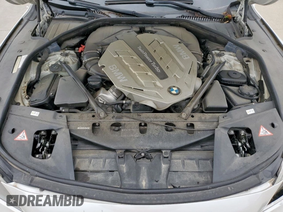 2011 BMW 7 Series 750Li with VIN WBAKB8C58BCY65645, listed as a Copart auction lot 57612775 with 69,670 mi miles and Salvage title. Bid and sale history available at DreamBid. Image 11.