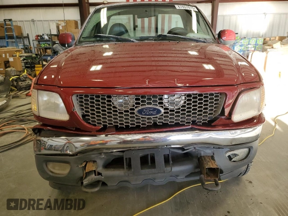 1999 Ford F-150 with VIN 1FTRF18W8XNB97257, listed as a Copart auction lot 87857815 with Not provided miles and Salvage title. Bid and sale history available at DreamBid. Image 5.