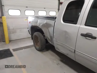 2013 Chevrolet Silverado 1500 LT with VIN 1GCRKSE73DZ328002, listed as a IAAI auction lot 41842745 with 124,496 mi miles and . Bid and sale history available at DreamBid. Image 6.