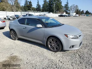 2011 Scion tC with VIN JTKJF5C76B3000765, listed as a Copart auction lot 53954445 with 243,554 mi miles and Salvage Title. Bid and sale history available at carsss.com. Image 4.
