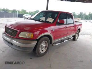 2003 Ford F-150 XLT with VIN 1FTRW07L13KD50168, listed as a IAAI auction lot 42815811 with Not provided miles and . Bid and sale history available at DreamBid. Image 2.