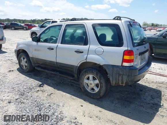 2003 Ford Escape XLS Popular z VIN 1FMYU02183KC05213, wystawiony jako IAAI lot #41955134 z przebiegiem 305 524 mil mil oraz . Historia ofert i sprzedaży dostępna na DreamBid. Obrazek 3.