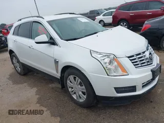 2015 Cadillac SRX z VIN 3GYFNAE30FS526693, wystawiony jako IAAI lot #42390910 z przebiegiem Nie podano mil oraz . Historia ofert i sprzedaży dostępna na DreamBid. Obrazek 1.