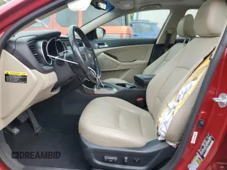 2015 Kia Optima EX z VIN 5XXGN4A76FG415365, wystawiony jako Copart lot #57275375 z przebiegiem 123 733 mil mil oraz Szkoda całkowita • Salvage title. Historia ofert i sprzedaży dostępna na DreamBid. Obrazek 7.