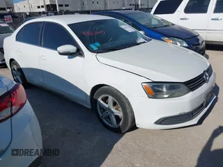 2014 Volkswagen Jetta SE with VIN 3VWD07AJ1EM281910, listed as a IAAI auction lot 42823665 with 86,182 mi miles and . Bid and sale history available at DreamBid. Image 1.