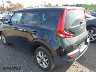 2022 Kia Soul LX with VIN KNDJ23AU0N7163473, listed as a IAAI auction lot 40776662 with 56,477 mi miles. Bid and sale history available at carsss.com. Image 3.