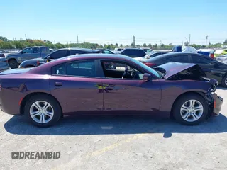 2020 Dodge Charger SXT with VIN 2C3CDXBG5LH220064, listed as a IAAI auction lot 42028723 with 25,140 mi miles and . Bid and sale history available at carsss.com. Image 13.