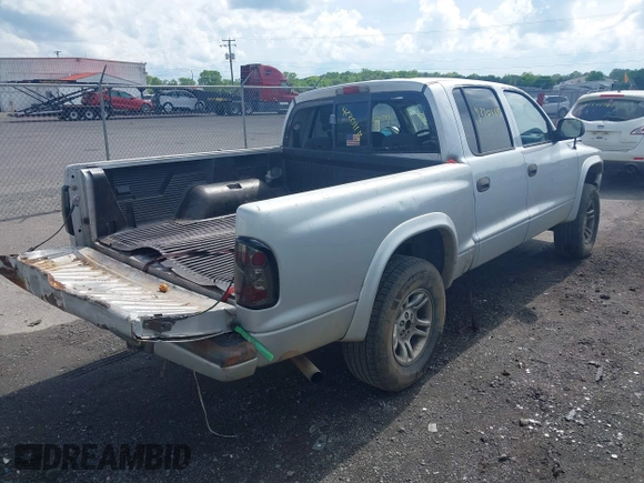 2004 Dodge Dakota Sport with VIN 1D7HG38N24S707004, listed as a IAAI auction lot 42201115 with 195,896 mi miles. Bid and sale history available at carsss.com. Image 4.