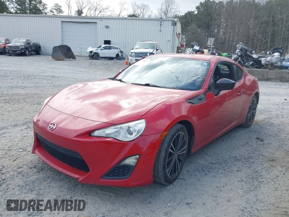 2015 Scion FR-S with VIN JF1ZNAA10F8702616, listed as a IAAI auction lot 41719852 with 95,855 mi miles. Bid and sale history available at carsss.com. Image 2.