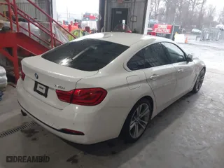 2019 BMW 4 Series 430i with VIN WBA4J1C53KBM17970, listed as a IAAI auction lot 41562291 with 50,377 mi miles. Bid and sale history available at carsss.com. Image 4.