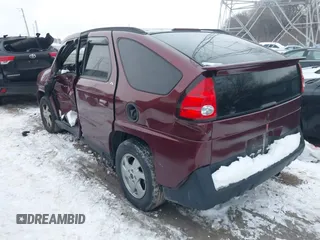 2002 Pontiac Aztek z VIN 3G7DA03E72S599401, wystawiony jako IAAI lot #41248586 z przebiegiem 135 971 mil mil oraz . Historia ofert i sprzedaży dostępna na DreamBid. Obrazek 3.