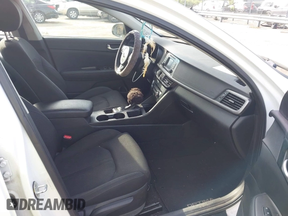 2016 Kia Optima LX with VIN 5XXGT4L34GG061718, listed as a IAAI auction lot 42176256 with 115,572 mi miles and . Bid and sale history available at carsss.com. Image 5.