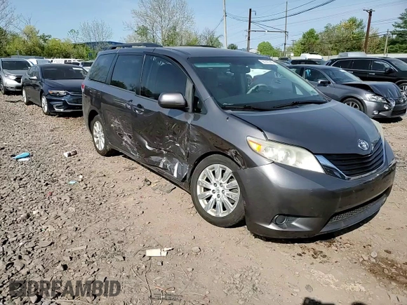 2014 Toyota Sienna LE with VIN 5TDJK3DC0ES080201, listed as a Copart auction lot 55147745 with 133,216 mi miles and Salvage Title. Bid and sale history available at DreamBid. Image 14.