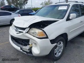 2004 Acura MDX Touring Pkg w/Navigation with VIN 2HNYD18834H520180, listed as a IAAI auction lot 41934124 with 201,817 mi miles. Bid and sale history available at carsss.com. Image 6.