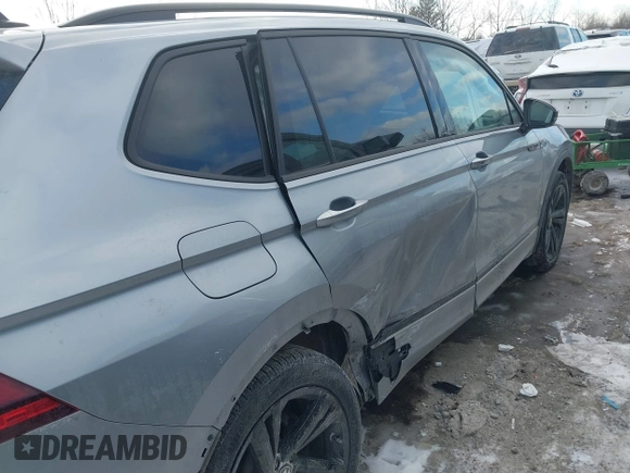 2023 Volkswagen Tiguan SE R-Line Black with VIN 3VV8B7AX3PM106873, listed as a IAAI auction lot 41402146 with 26,701 mi miles and . Bid and sale history available at DreamBid. Image 6.