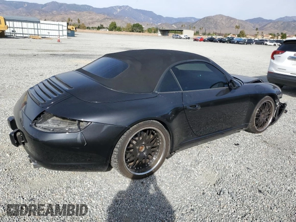 2006 Porsche 911 Carrera S with VIN WP0CB29906S766408, listed as a Copart auction lot 79298064 with 49,449 mi miles and Salvage Title. Bid and sale history available at carsss.com. Image 3.