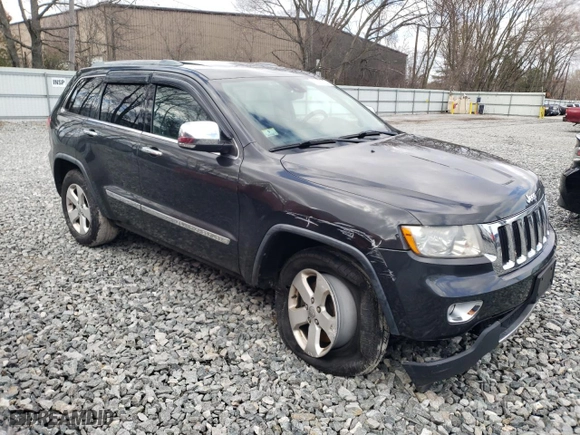2011 Jeep Grand Cherokee Limited with VIN 1J4RR5GG9BC580700, listed as a Copart auction lot 52032135 with 235,343 mi miles and Clean Title. Bid and sale history available at carsss.com. Image 4.