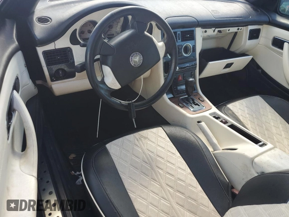 1998 Mercedes-Benz SLK 230/320 z VIN WDBKK47F9WF019235, wystawiony jako Copart lot #46457955 z przebiegiem Nie podano mil oraz Nie do naprawy • Non repairable. Historia ofert i sprzedaży dostępna na DreamBid. Obrazek 8.