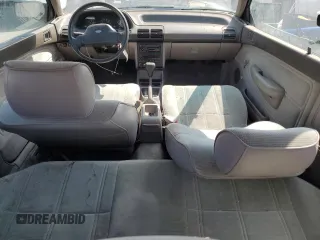1992 Ford Escort z VIN 1FAPP11JXNW156984, wystawiony jako Copart lot #63462264 z przebiegiem 37 774 mil mil oraz Szkoda całkowita • Salvage title. Historia ofert i sprzedaży dostępna na DreamBid. Obrazek 8.