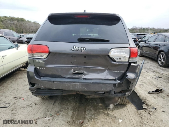 2015 Jeep Grand Cherokee Laredo with VIN 1C4RJFAG4FC627438, listed as a Copart auction lot 44078074 with 123,681 mi miles and Salvage Title. Bid and sale history available at carsss.com. Image 6.