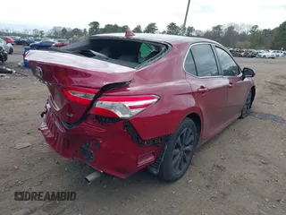 2020 Toyota Camry LE with VIN 4T1C11AK4LU920044, listed as a IAAI auction lot 42084112 with 96,745 mi miles and . Bid and sale history available at carsss.com. Image 4.