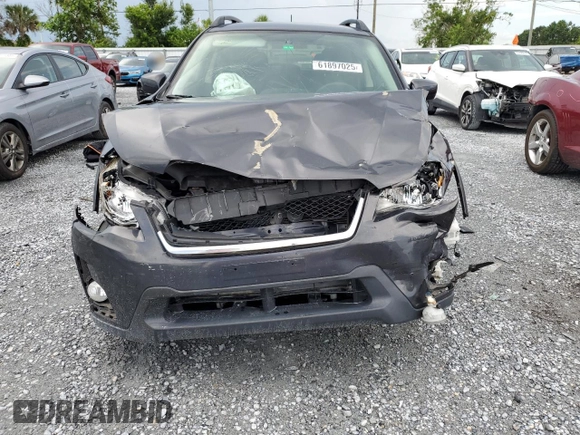 2016 Subaru Crosstrek Premium with VIN JF2GPABC7G8310912, listed as a Copart auction lot 61897025 with 125,394 mi miles and Salvage title. Bid and sale history available at DreamBid. Image 5.