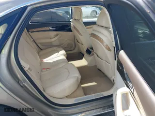 2012 Audi A8 L with VIN WAURVAFD0CN001646, listed as a IAAI auction lot 41524110 with 105,187 mi miles. Bid and sale history available at carsss.com. Image 8.