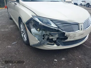 2014 Lincoln MKZ Hybrid with VIN 3LN6L2LU8ER813195, listed as a IAAI auction lot 42578644 with 153,893 mi miles and . Bid and sale history available at DreamBid. Image 6.