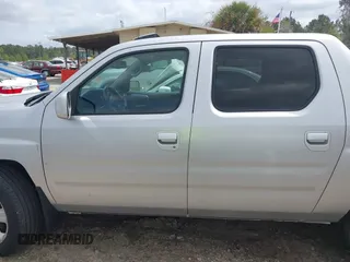 2014 Honda Ridgeline RTL with VIN 5FPYK1F53EB013752, listed as a IAAI auction lot 41886851 with 89,038 mi miles and . Bid and sale history available at DreamBid. Image 14.