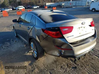 2014 Kia Optima SX Turbo with VIN 5XXGR4A62EG272392, listed as a IAAI auction lot 41236920 with 189,504 mi miles and . Bid and sale history available at DreamBid. Image 3.