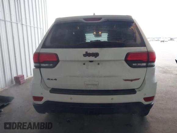 2018 Jeep Grand Cherokee Trailhawk with VIN 1C4RJFLGXJC264438, listed as a IAAI auction lot 40974417 with 117,717 mi miles and . Bid and sale history available at DreamBid. Image 16.