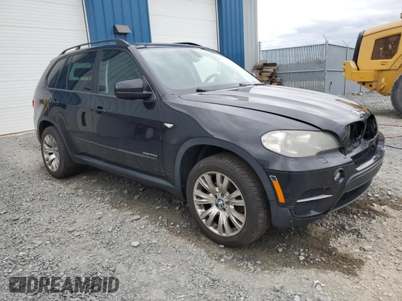 2012 BMW X5 35i z VIN 5UXZV4C5XCL752071, wystawiony jako Copart lot #56623145 z przebiegiem 180 161 mil mil oraz Czysty tytuł • Clean title. Historia ofert i sprzedaży dostępna na DreamBid. Obrazek 4.
